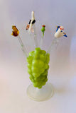 Retro Glass bird Sizzle Sticks in green bubble holder
