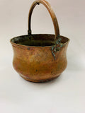 Antique beaten copper cauldron
