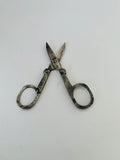 Antique folding scissors