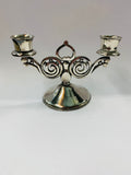 Pair of ornate silver plated candlesticks