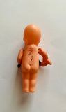 Vintage Celluloid Kewpie doll with dumb bells