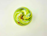 Clear Paperweight with Internal Amber Piece with Twisted Green and Yellow Outer Shell