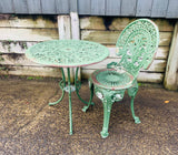Heavy Antique cast iron patio table and chair
