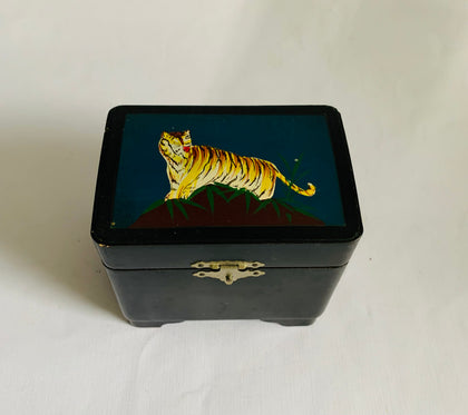 Lacquer musical jewellery box with tiger on the top