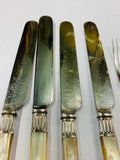 Set of 8 mother of Pearl handled dessert knives and forks