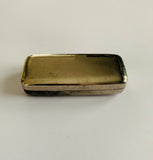 Antique medical surgical syringe in a metal case