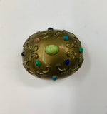 Brass musical egg with semi precious stones