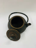 Cast iron antique tea pot