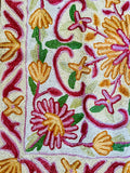 Thick embroidered cushion cover with floral pattern ￼
