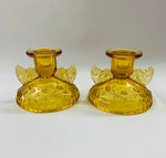Pair of Amber Glass butterfly candlesticks