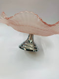 Pink depression glass cake stand