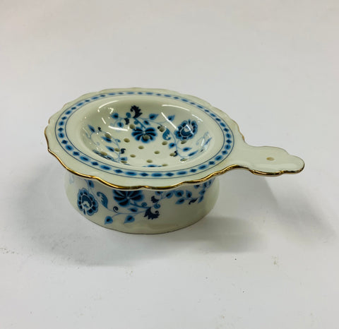 Antique ceramic tea strainer