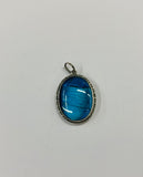 Antique silver and butterfly wing pendant