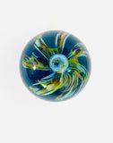 Blue Paperweight with Orange Red and White Flower in the Center