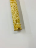 Ornately carved large bone needle case