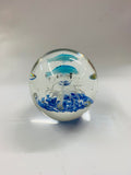 Vintage glass Paperweight with dolphins inside