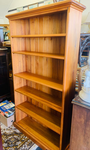 Tall solid wooden bookcase