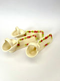 Eight Porcelain name plates with flower baskets attached ￼