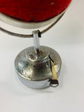 Chrome plated pin cushion and tape measure