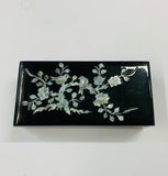 Black lacquer and mother of pearl jewellery box