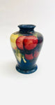 Moorcroft Small Blue Vase with Yellow and Red Fruit and Tapered Bottom