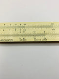 Antique slide rule in case