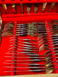 44 piece brass and teak wooden handled cutlery set