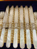 Ornate silver plated and mother of Pearl antique cutlery set