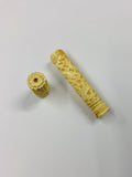 Ornately carved large bone needle case