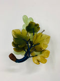 Bunch of vintage green jade or stone grapes