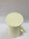 White hand potted beehive style jug