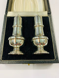 Pair of Sterling Silver salt and pepper shakers in original box