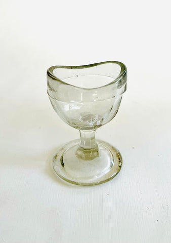Clear Glass Eye Bath on stand