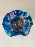 Rare purple/blue carnival glass compote with Peacock design