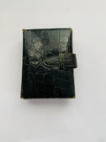 Vintage folding green leather needle case
