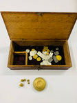Antique gold weighing scales in box with weights