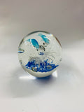 Vintage glass Paperweight with dolphins inside