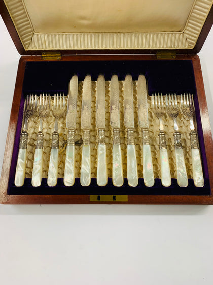 Ornate silver plated and mother of Pearl antique cutlery set