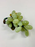 Bunch of vintage green jade or stone grapes