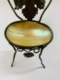 Antique brass and mother of Pearl seat