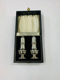Pair of Sterling Silver salt and pepper shakers in original box