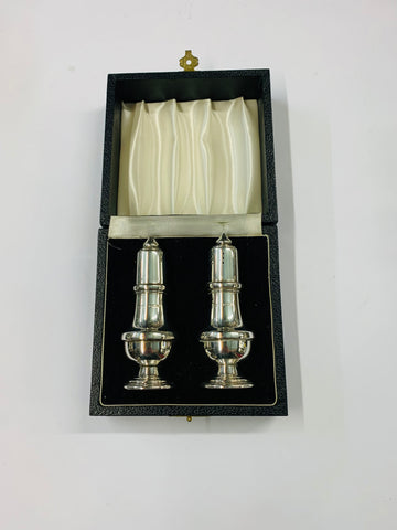 Pair of Sterling Silver salt and pepper shakers in original box