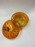 Orange carnival glass lidded bowl