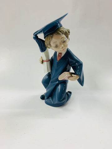 Lladro boy graduating
