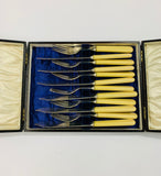 Antique bone handled fish cutlery set in original wooden box