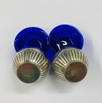 Pair of sterling silver and cobalt blue glass salt pots