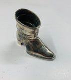 Antique metal boot