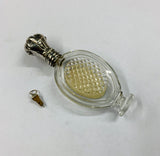 Antique silver and glass perfume bottle