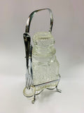 Vintage glass olive jar with fork