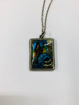 Sterling silver and butterfly wing pendant